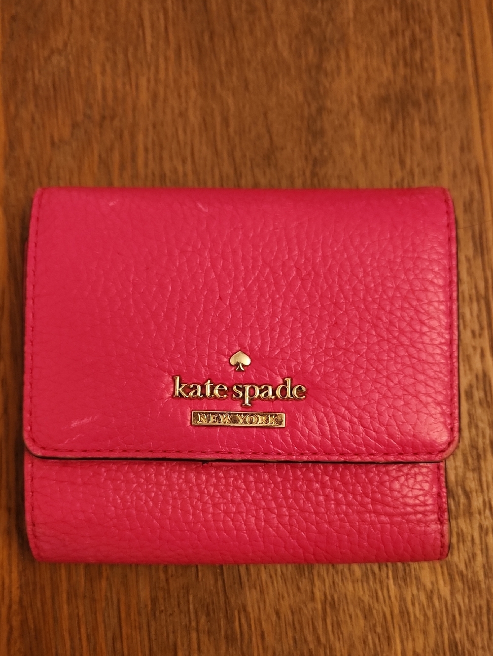kate spade hot pink pebbled leather trifold wallet